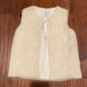 Eyelet and Ivy vest with ribbon tie.  Girls size 6.  Faux fleece in cream.